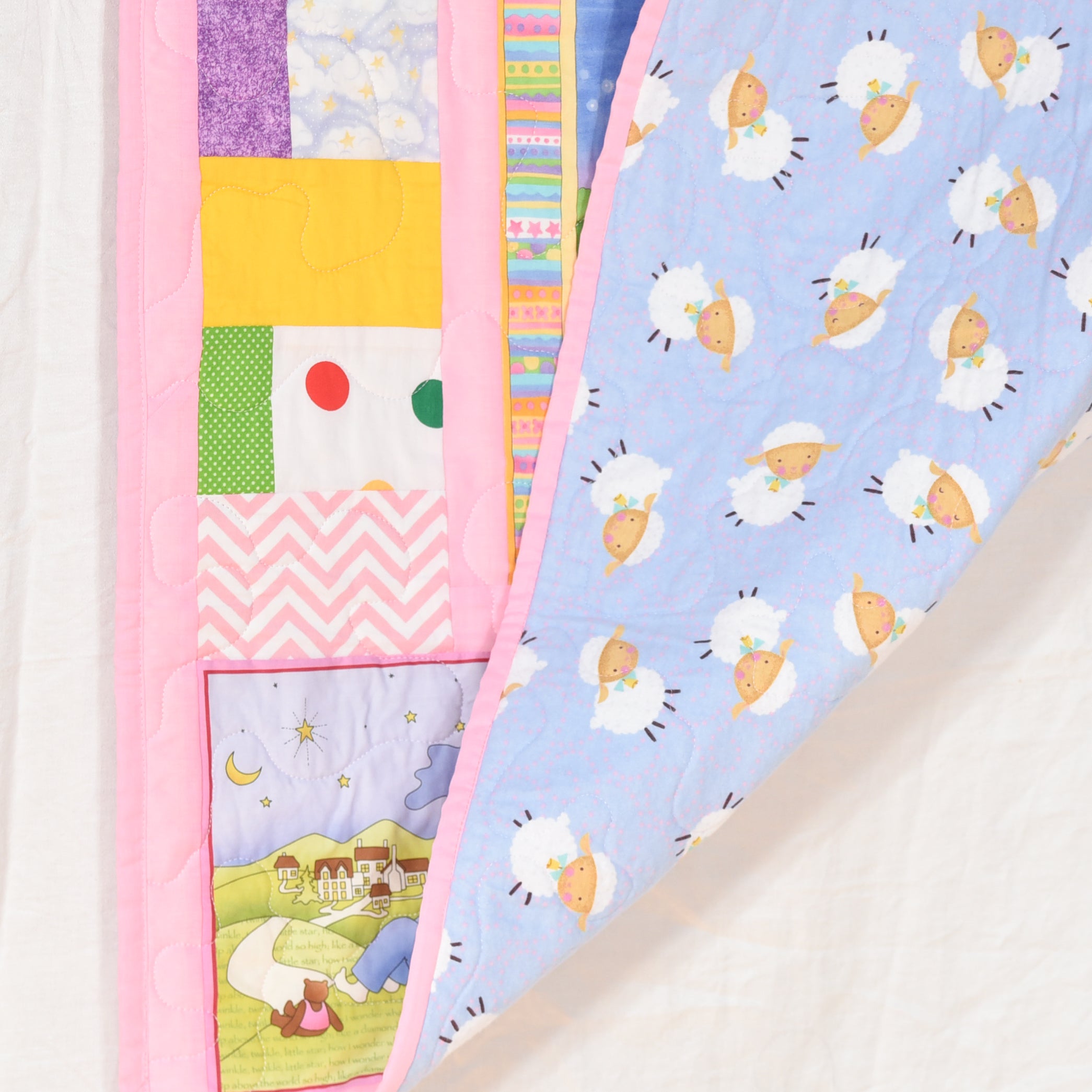 Adorable Pink Nursery Rhyme Quilt