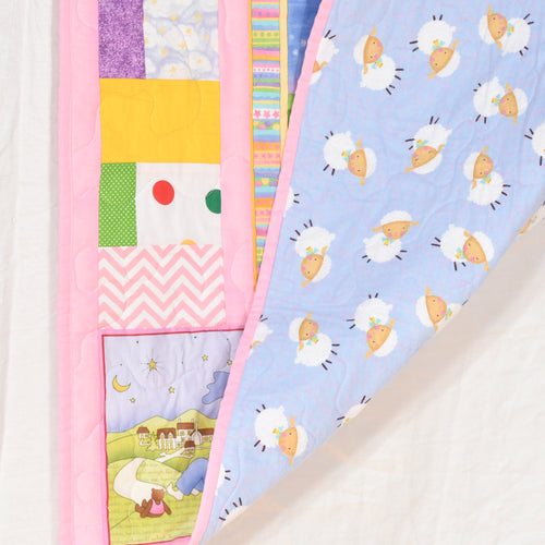 Adorable Pink Nursery Rhyme Quilt