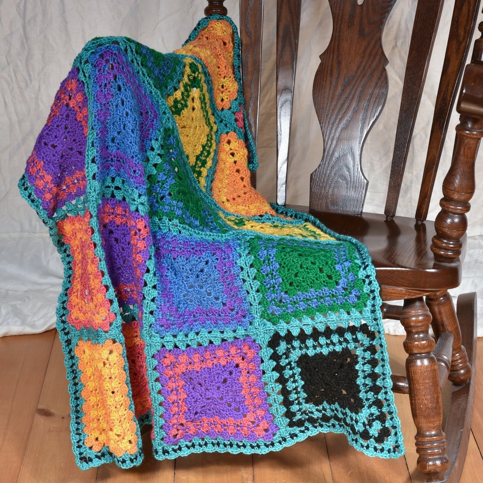 Trimmed in Teal Rainbow Crochet Blanket