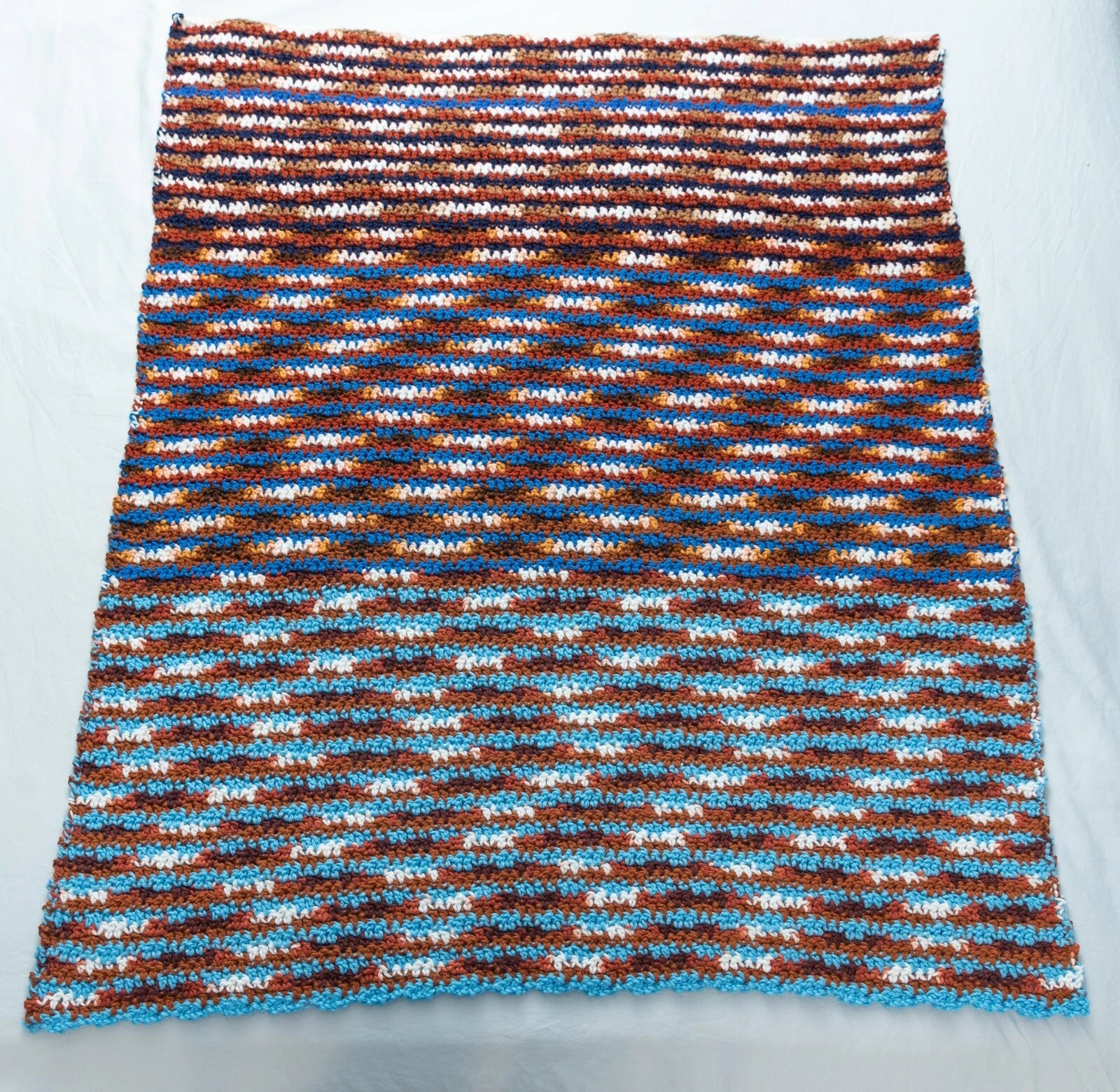 Blue and Brown Multicolored Striped Crochet Blanket
